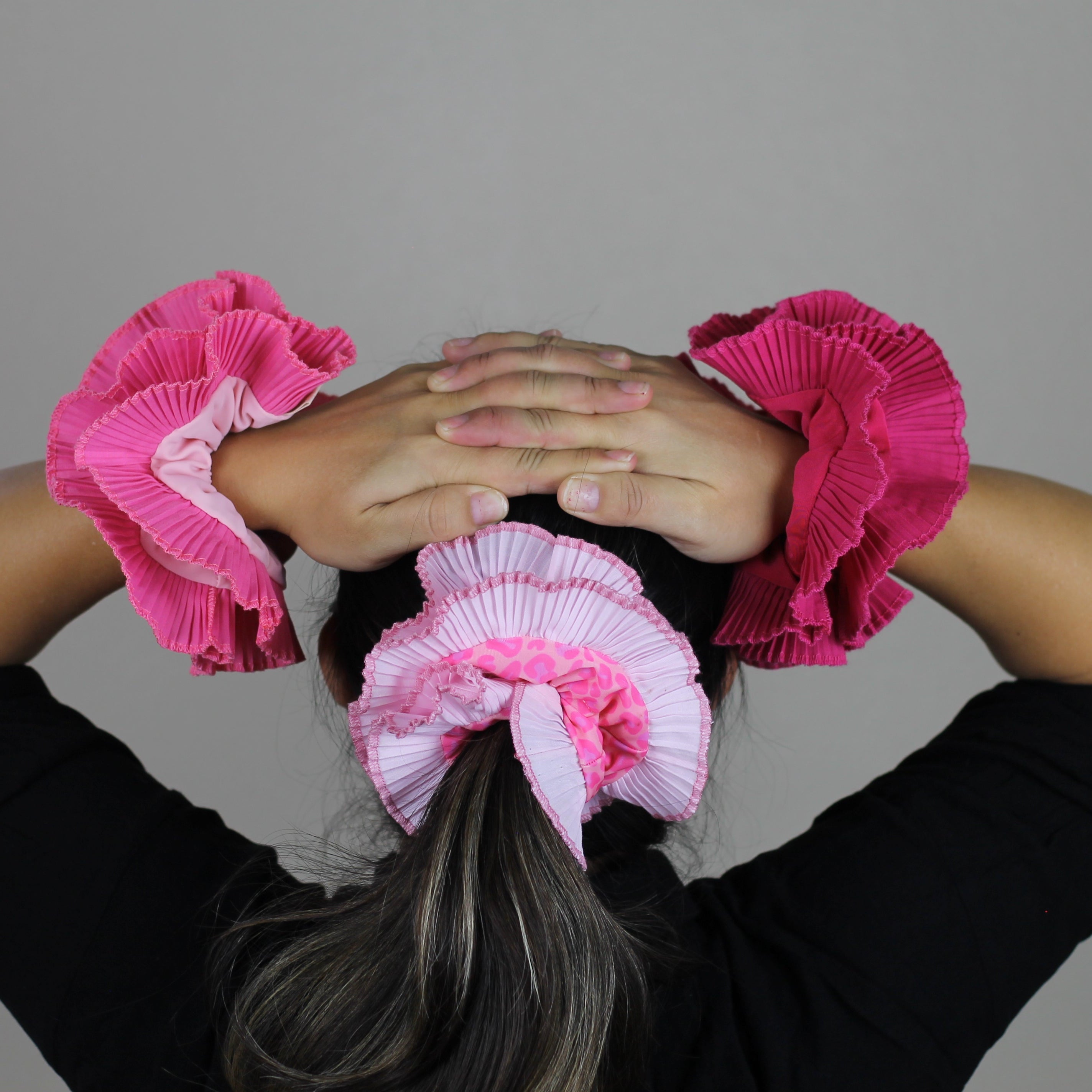 three pink Scrunchies